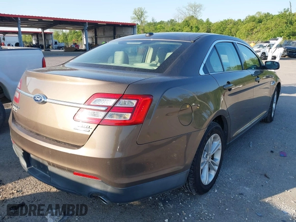 2015 Ford Taurus SEL z VIN 1FAHP2E84FG125243, wystawiony jako IAAI lot #42045847 z przebiegiem 42 093 mil mil oraz . Historia ofert i sprzedaży dostępna na DreamBid. Obrazek 4.