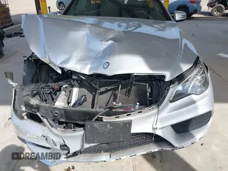 2016 Mercedes-Benz E 400 with VIN WDDKJ6HB6GF328700, listed as a IAAI auction lot 42157340 with 125,183 mi miles and . Bid and sale history available at DreamBid. Image 12.