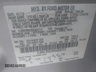 2013 Lincoln MKS с VIN 1LNHL9DK3DG604712, выставлен на аукционе IAAI как лот 42351237 с пробегом 144 927 миль миль и . История ставок и продаж доступна на DreamBid. Изображение 9.