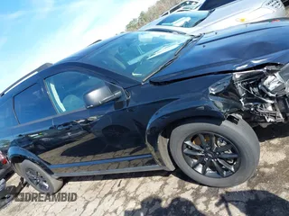 2020 Dodge Journey SE Value with VIN 3C4PDCAB1LT232358, listed as a IAAI auction lot 41821361 with 54,459 mi miles and . Bid and sale history available at DreamBid. Image 14.