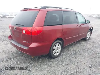 2010 Toyota Sienna CE with VIN 5TDKK4CCXAS318352, listed as a IAAI auction lot 41909416 with 228,041 mi miles. Bid and sale history available at carsss.com. Image 4.