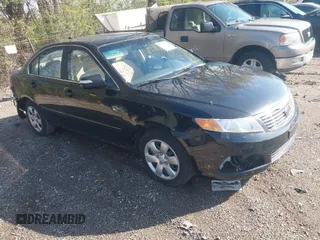 2010 Kia Optima LX with VIN KNAGG4A86A5391811, listed as a IAAI auction lot 41928441 with 152,385 mi miles. Bid and sale history available at carsss.com. Image 1.