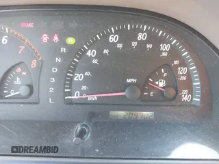 2004 Toyota Camry LE with VIN 4T1BF30K64U067898, listed as a IAAI auction lot 42131958 with 209,702 mi miles. Bid and sale history available at carsss.com. Image 7.
