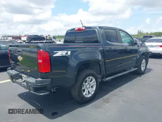 2018 Chevrolet Colorado 2WD LT z VIN 1GCGSCEA9J1137767, wystawiony jako IAAI lot #42389519 z przebiegiem 116 547 mil mil oraz . Historia ofert i sprzedaży dostępna na DreamBid. Obrazek 4.
