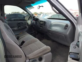 2001 Ford F-150 XL z VIN 1FTRX17W61NA73638, wystawiony jako IAAI lot #41543338 z przebiegiem Nie podano mil oraz . Historia ofert i sprzedaży dostępna na DreamBid. Obrazek 5.