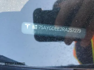 2024 Tesla Model Y Long Range с VIN 7SAYGDEE2RA257279, выставлен на аукционе Copart как лот 61248255 с пробегом Не указан миль и Списание • Salvage title. История ставок и продаж доступна на DreamBid. Изображение 12.