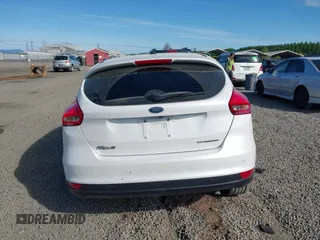 2017 Ford Focus Titanium with VIN 1FADP3N24HL308751, listed as a IAAI auction lot 42207247 with 109,736 mi miles and . Bid and sale history available at DreamBid. Image 17.
