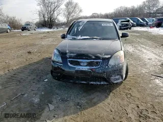 2010 Kia Rio LX with VIN KNADH4A39A6651648, listed as a Copart auction lot 42202755 with 32,617 mi miles and Salvage Title. Bid and sale history available at carsss.com. Image 10.