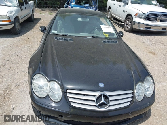 2005 Mercedes-Benz SL 55 AMG with VIN WDBSK74F85F101039, listed as a IAAI auction lot 42812397 with 76,452 mi miles and . Bid and sale history available at DreamBid. Image 12.