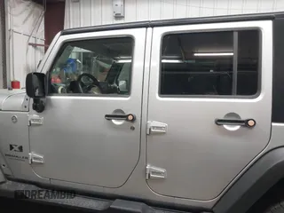 2008 Jeep Wrangler Unlimited X with VIN 1J8GA391X8L606188, listed as a IAAI auction lot 42053480 with 136,844 mi miles and . Bid and sale history available at DreamBid. Image 14.