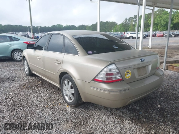 2005 Ford Five Hundred SE z VIN 1FAFP23145G127490, wystawiony jako IAAI lot #42122316 z przebiegiem 202 975 mil mil oraz . Historia ofert i sprzedaży dostępna na DreamBid. Obrazek 3.