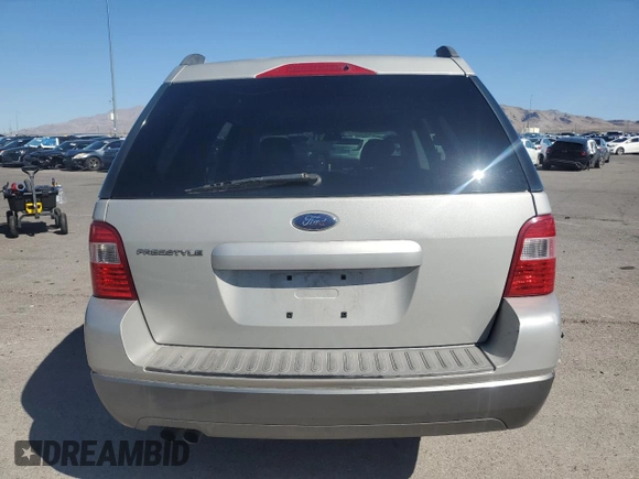 2006 Ford Freestyle SE z VIN 1FMZK011X6GA00401, wystawiony jako Copart lot #56218835 z przebiegiem 148 590 mil mil oraz Szkoda całkowita • Salvage title. Historia ofert i sprzedaży dostępna na DreamBid. Obrazek 6.