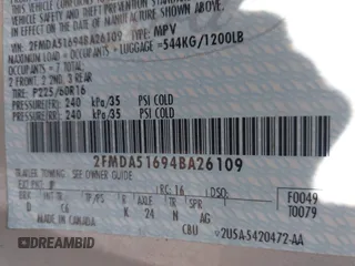 2004 Ford Freestar SE z VIN 2FMDA51694BA26109, wystawiony jako IAAI lot #42207309 z przebiegiem 124 934 mil mil oraz . Historia ofert i sprzedaży dostępna na DreamBid. Obrazek 9.