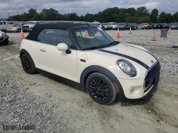 2016 MINI Cooper Convertible with VIN WMWWG5C56G3C18883, listed as a Copart auction lot 70001434 with 57,985 mi miles and Salvage Title. Bid and sale history available at carsss.com. Image 4.