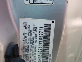 2000 Honda Civic EX with VIN 1HGEJ8240YL059711, listed as a Copart auction lot 69014064 with 144,354 mi miles and Salvage Title. Bid and sale history available at carsss.com. Image 13.
