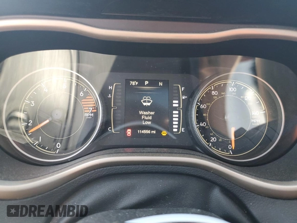 2016 Jeep Cherokee 75th Anniversary z VIN 1C4PJLCB7GW307294, wystawiony jako Copart lot #55767945 z przebiegiem 114 556 mil mil oraz Szkoda całkowita • Salvage title. Historia ofert i sprzedaży dostępna na DreamBid. Obrazek 9.