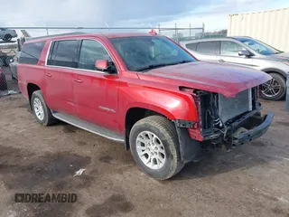 2015 GMC Yukon XL SLT z VIN 1GKS2HKC9FR586876, wystawiony jako IAAI lot #41820563 z przebiegiem 135 741 mil mil oraz . Historia ofert i sprzedaży dostępna na DreamBid. Obrazek 1.