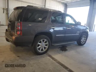 2010 GMC Yukon Denali z VIN 1GKUKEEFXAR179946, wystawiony jako Copart lot #57218255 z przebiegiem 155 971 mil mil oraz Czysty tytuł • Clean title. Historia ofert i sprzedaży dostępna na DreamBid. Obrazek 3.