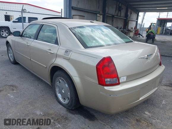 2006 Chrysler 300 Touring with VIN 2C3KA53G56H309497, listed as a IAAI auction lot 41792324 with 128,492 mi miles. Bid and sale history available at carsss.com. Image 3.