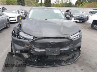 2022 Ford Mustang Mach-E Select z VIN 3FMTK1RM3NMA25588, wystawiony jako IAAI lot #42181256 z przebiegiem 44 753 mil mil oraz . Historia ofert i sprzedaży dostępna na DreamBid. Obrazek 12.
