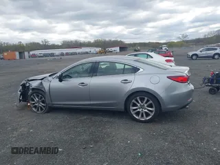 2014 Mazda 6 i Touring with VIN JM1GJ1V64E1147549, listed as a IAAI auction lot 42041025 with 124,400 mi miles and . Bid and sale history available at DreamBid. Image 14.