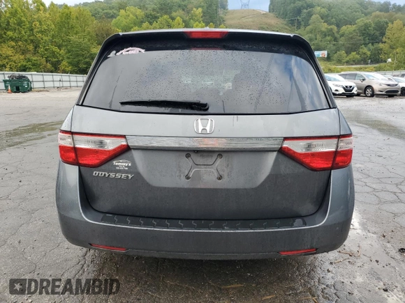 2012 Honda Odyssey EX-L with VIN 5FNRL5H64CB035196, listed as a Copart auction lot 71566704 with 243,529 mi miles and Salvage Title. Bid and sale history available at carsss.com. Image 6.