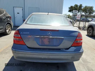 2004 Mercedes-Benz E-Class 5.0L with VIN WDBUF70JX4A479530, listed as a Copart auction lot 68093214 with 165,986 mi miles and Clean Title. Bid and sale history available at carsss.com. Image 6.
