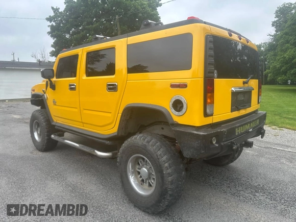 2003 Hummer H2 z VIN 5GRGN23U53H141743, wystawiony jako Copart lot #60153185 z przebiegiem 137 863 mil mil oraz Czysty tytuł • Clean title. Historia ofert i sprzedaży dostępna na DreamBid. Obrazek 3.