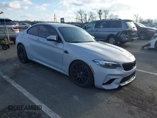 2020 BMW M2 Competition z VIN WBS2U7C02L7F02100, wystawiony jako IAAI lot #41019546 z przebiegiem 50 593 mil mil oraz . Historia ofert i sprzedaży dostępna na DreamBid. Obrazek 1.