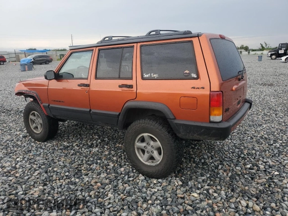 1999 Jeep Cherokee Sport with VIN 1J4FF68S7XL560943, listed as a Copart auction lot 58425505 with 68,654 mi miles and Salvage title. Bid and sale history available at DreamBid. Image 2.