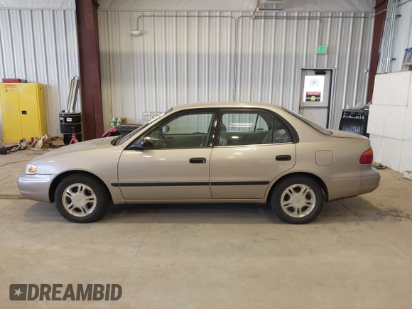 2001 Chevrolet Prizm z VIN 1Y1SK52811Z400984, wystawiony jako IAAI lot #42550019 z przebiegiem 226 246 mil mil oraz . Historia ofert i sprzedaży dostępna na DreamBid. Obrazek 14.