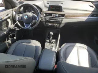 2017 BMW X1 xDrive28i z VIN WBXHT3Z37H4A54544, wystawiony jako Copart lot #55019535 z przebiegiem 76 822 mil mil oraz Szkoda całkowita • Salvage title. Historia ofert i sprzedaży dostępna na DreamBid. Obrazek 8.