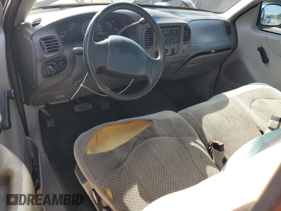 2000 Ford F-150 XL z VIN 3FTZF172XYMA81391, wystawiony jako Copart lot #62108855 z przebiegiem Nie podano mil oraz Szkoda całkowita • Salvage title. Historia ofert i sprzedaży dostępna na DreamBid. Obrazek 8.