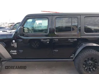 2019 Jeep Wrangler Unlimited Sport S with VIN 1C4HJXDN6KW686480, listed as a IAAI auction lot 41300842 with 67,359 mi miles and . Bid and sale history available at DreamBid. Image 14.