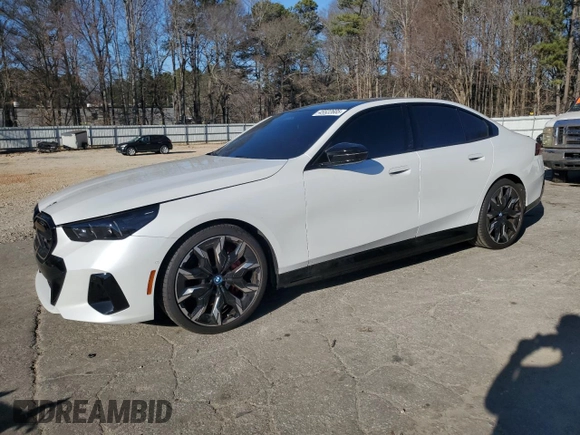 2024 BMW i5 M60 with VIN WBY43FK00RCP86174, listed as a Copart auction lot 45522685 with 7,392 mi miles and Salvage title. Bid and sale history available at DreamBid. Image 1.