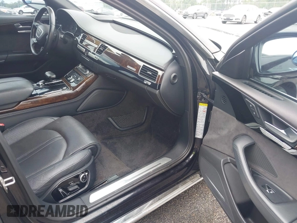 2015 Audi A8 4.0T z VIN WAU32AFD9FN023826, wystawiony jako IAAI lot #42353372 z przebiegiem 94 833 mil mil oraz . Historia ofert i sprzedaży dostępna na DreamBid. Obrazek 5.