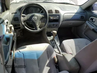 2003 Mazda Protege DX with VIN JM1BJ225030144551, listed as a Copart auction lot 50769905 with 179,876 mi miles and Salvage Title. Bid and sale history available at DreamBid. Image 8.