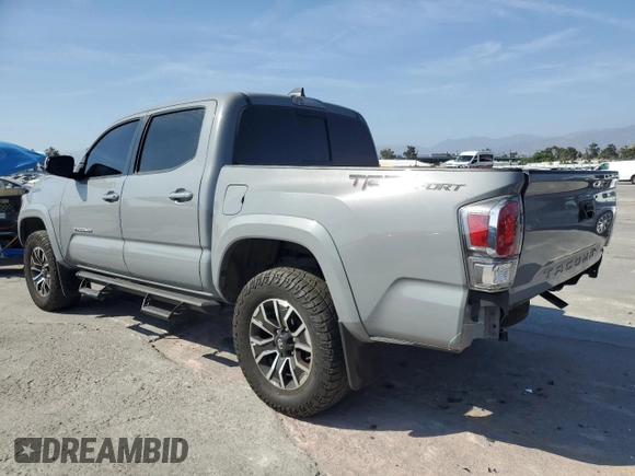 2020 Toyota Tacoma SR5 with VIN 3TMAZ5CN2LM137991, listed as a Copart auction lot 60317895 with 98,054 mi miles and Salvage title. Bid and sale history available at DreamBid. Image 2.