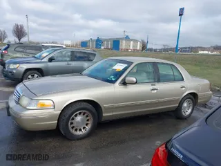 1999 Ford Crown Victoria LX with VIN 2FAFP74W0XX179512, listed as a IAAI auction lot 41124866 with 101,282 mi miles. Bid and sale history available at carsss.com. Image 14.