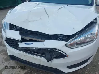 2016 Ford Focus SE z VIN 1FADP3F29GL346196, wystawiony jako IAAI lot #42171014 z przebiegiem 80 913 mil mil oraz . Historia ofert i sprzedaży dostępna na DreamBid. Obrazek 6.