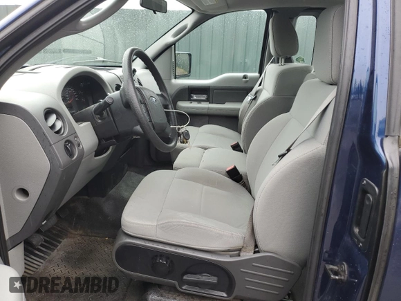 2007 Ford F-150 XL with VIN 1FTRF12287NA48062, listed as a Copart auction lot 55933815 with 113,308 mi miles and Salvage title. Bid and sale history available at DreamBid. Image 7.