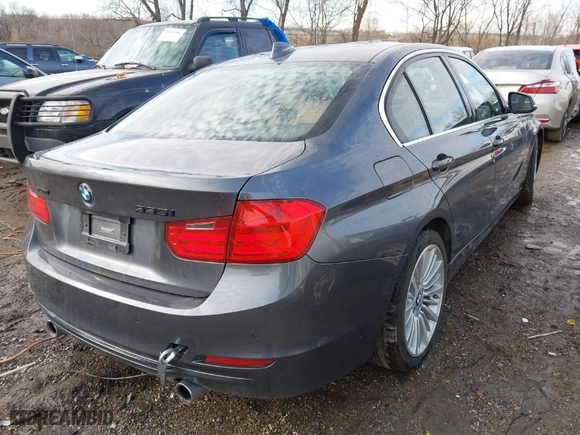 2014 BMW 3 Series 335i xDrive with VIN WBA3B9C53EF588061, listed as a IAAI auction lot 41652035 with 123,345 mi miles. Bid and sale history available at carsss.com. Image 4.