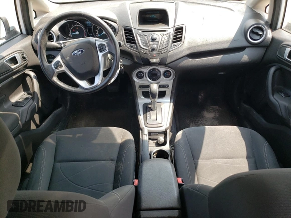 2015 Ford Fiesta SE z VIN 3FADP4EJ7FM169000, wystawiony jako Copart lot #64402674 z przebiegiem 191 221 mil mil oraz Szkoda całkowita • Salvage title. Historia ofert i sprzedaży dostępna na DreamBid. Obrazek 8.