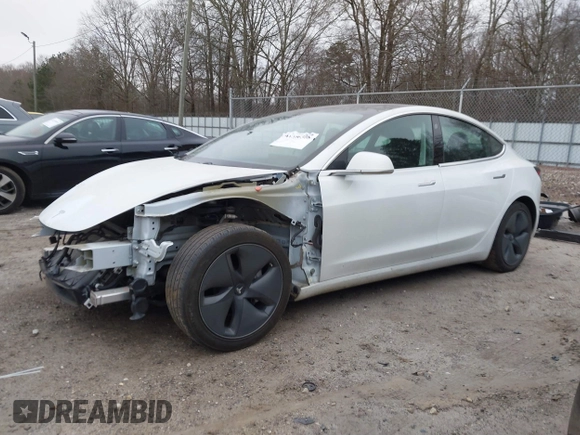 2020 Tesla Model 3 Standard Range Plus with VIN 5YJ3E1EA1LF799766, listed as a IAAI auction lot 41386508 with 90,000 mi miles. Bid and sale history available at carsss.com. Image 15.