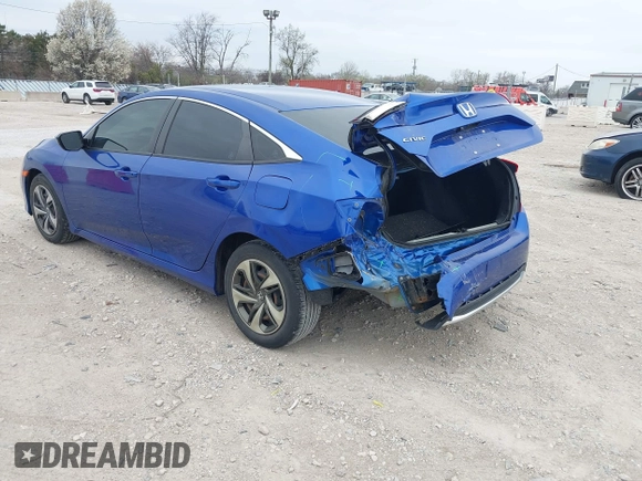 2020 Honda Civic LX with VIN 2HGFC2F69LH550744, listed as a IAAI auction lot 42079594 with 34,724 mi miles and . Bid and sale history available at DreamBid. Image 3.