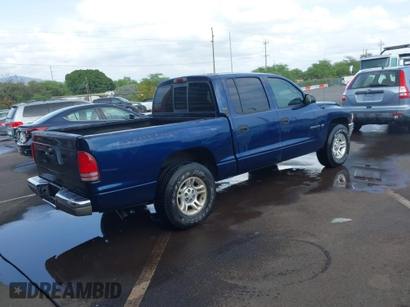 2001 Dodge Dakota Sport with VIN 1B7GL2AX01S133957, listed as a IAAI auction lot 41644558 with 156,008 mi miles. Bid and sale history available at carsss.com. Image 4.