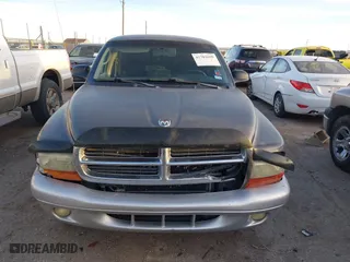 2002 Dodge Dakota SLT with VIN 1B7GL42X42S682184, listed as a IAAI auction lot 41784688 with 168,298 mi miles. Bid and sale history available at carsss.com. Image 12.