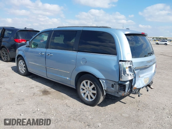 2013 Chrysler Town & Country Touring with VIN 2C4RC1BG3DR736862, listed as a IAAI auction lot 42131041 with 130,505 mi miles and . Bid and sale history available at DreamBid. Image 3.