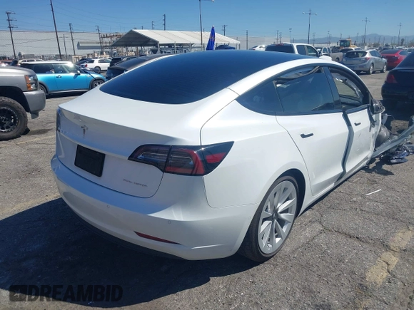 2022 Tesla Model 3 Long Range with VIN 5YJ3E1EB7NF298456, listed as a IAAI auction lot 41859304 with Not Provided miles and . Bid and sale history available at DreamBid. Image 4.
