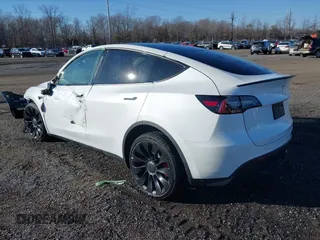 2022 Tesla Model Y Performance with VIN 7SAYGDEF5NF542189, listed as a IAAI auction lot 41643254 with 18,865 mi miles and . Bid and sale history available at DreamBid. Image 3.